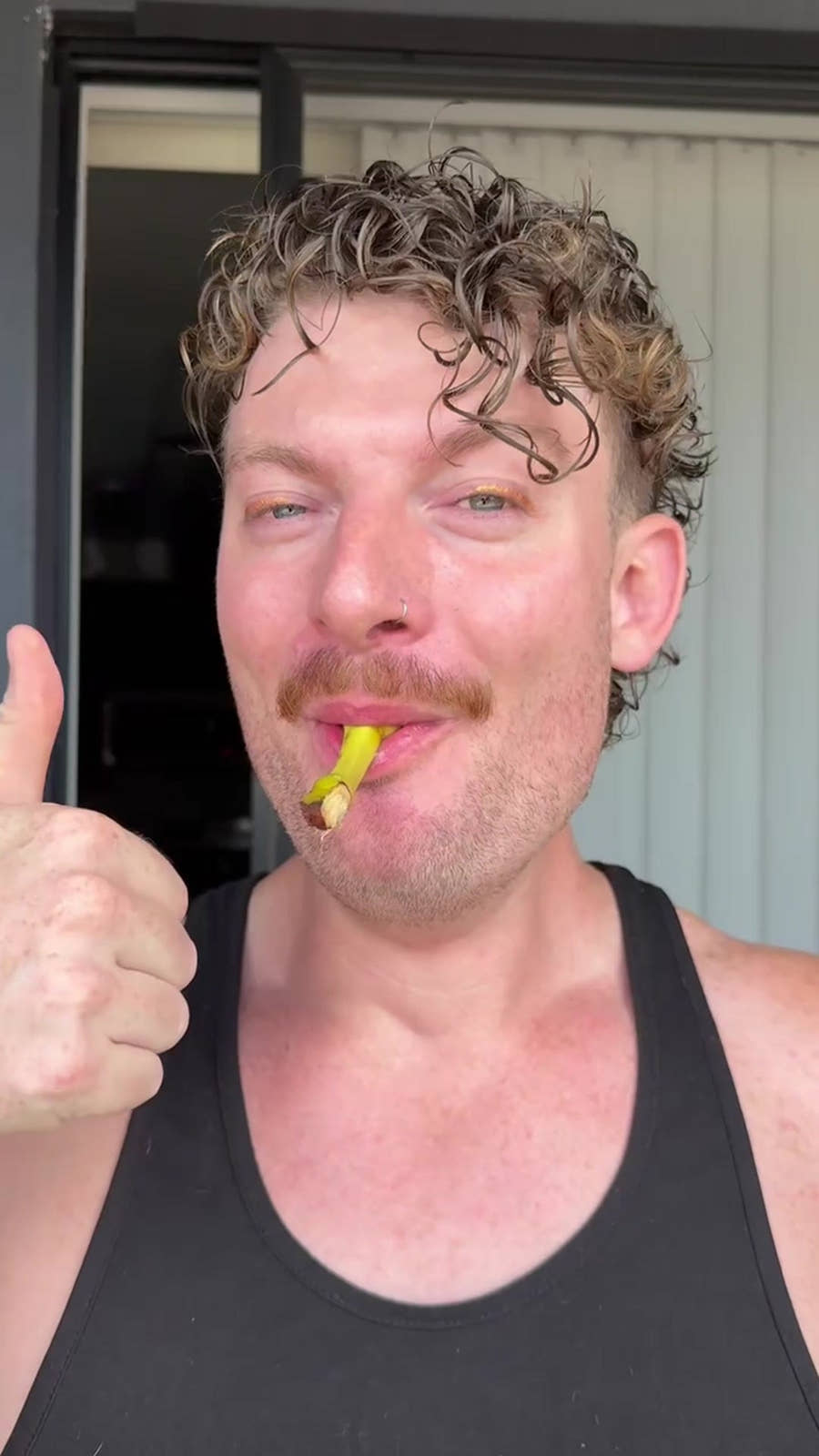 Alex gives a thumbs up after his on-camera GoBlo gag reflex test