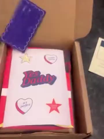 Someone unboxes GoBlo and lifts the pouch out of the box.